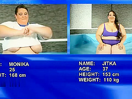 2 supersized BBWs fighting in the ring totally naked