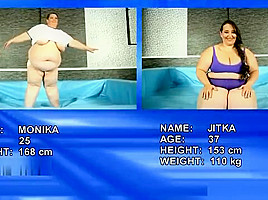 2 supersized BBWs fighting in the ring totally naked