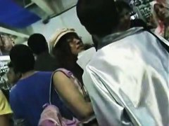 A hip tanned brunette in a hat has her ass filmed in an upskirt porno