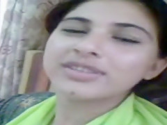 Adorable Pakistani wife kisses her fashionable spouse
