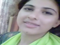 Adorable Pakistani wife kisses her fashionable spouse