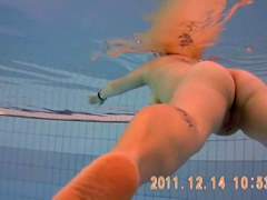 Amateur beauty is swimming nude on under water 3