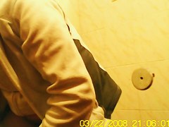 Amateur girls is pissing in the public toilet getting spied