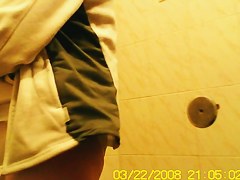 Amateur girls is pissing in the public toilet getting spied