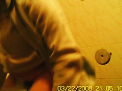 Amateur girls is pissing in the public toilet getting spied