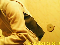 Amateur girls is pissing in the public toilet getting spied