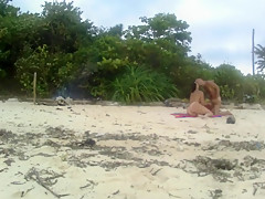 Amateur yang couple were catched fucking on a public beach