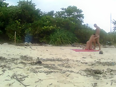 Amateur yang couple were catched fucking on a public beach