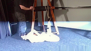 American damsel Caroline Pierce in hogtied bondage