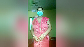 An Indian Woman In A Red Gown Showing Off Her Body And Playing With Her Boobs