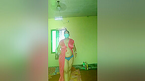 An Indian Woman In A Red Gown Showing Off Her Body And Playing With Her Boobs