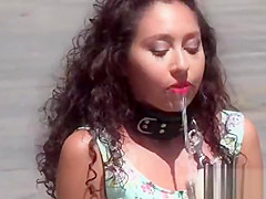 Anal plugged petite slave in public