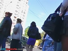 Angel in hot pantyhose up petticoat in the street