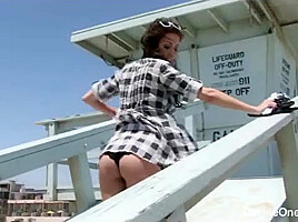 April O'Neal flashes at the beach - Devineones