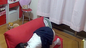 Asian babe rubs herself