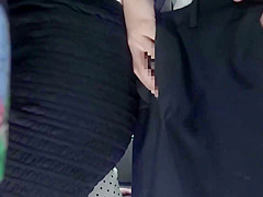 Asian beauty in black pantyhose is sucking dick and getting fucked in a public bus