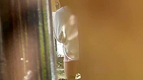 Asian ho peeing her panties in street