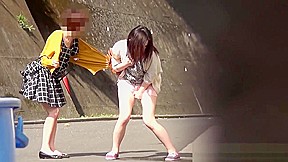 Asian ho peeing her panties in street