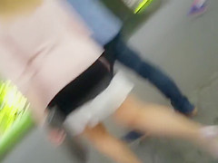 Attractive blonde lady jiggles her butt as she walks
