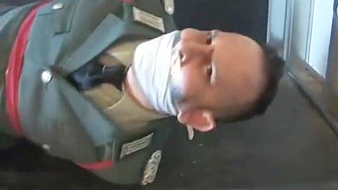 BG Military officer trussed up and gagged 