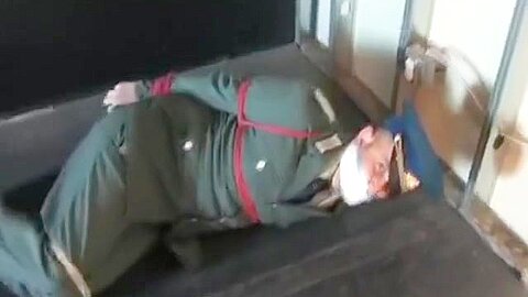 BG Military officer trussed up and gagged 