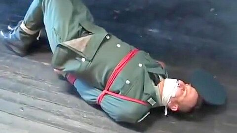 BG Military officer trussed up and gagged 