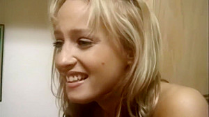 BLONDE BEAUTY PISSING IN THE KITCHEN SINK