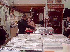 Babe in lingerie gives blowjob in public