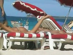 Beach movies present hot naked bodies basking in the sun