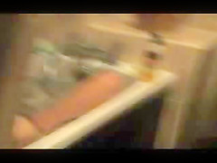 Big tits and belly float in the bath