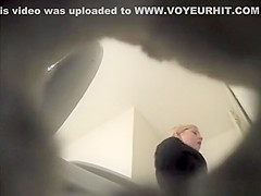 Blonde girl in toilet with