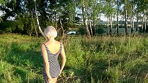 Blonde masturbates in the forest  Close-up 
