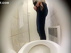 Blonde woman sits and pees