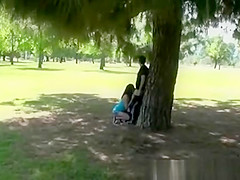 Blowjob in public park
