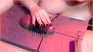 Bound cock brought to orgasm by slight touch 