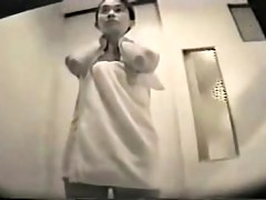 Brunette after shower gives hot spied flash of furry cunt