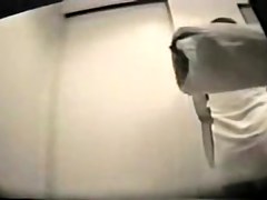 Brunette after shower gives hot spied flash of furry cunt