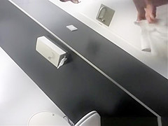 Brunette girl pulling down her bikini bottom and pissing
