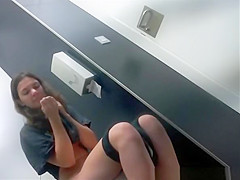 Brunette girl pulling down her bikini bottom and pissing