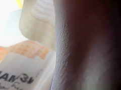 Brunette girl wearing short dress upskirt