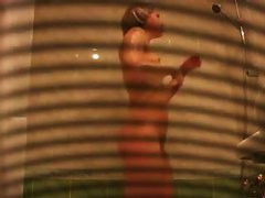 Bubble butt brunette captured on a shower