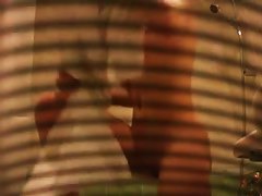 Bubble butt brunette captured on a shower