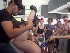 Busty brunette fucked in public with dildo