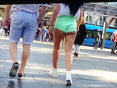 Candid Brunette in tight short street public