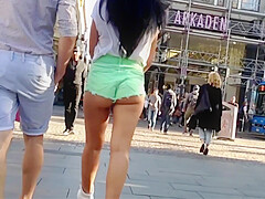 Candid Brunette in tight short street public