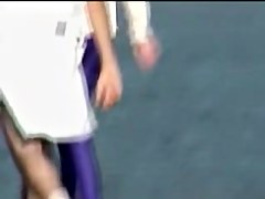 Candid amateur in lilac pantyhose walking along the quay 03zm