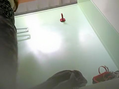Changing room footage of girl trying on bras