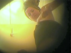 Charming semi spheres of naked butt on dressing room cam