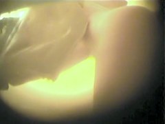 Charming semi spheres of naked butt on dressing room cam