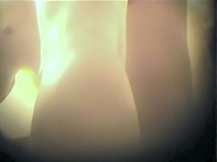 Charming semi spheres of naked butt on dressing room cam